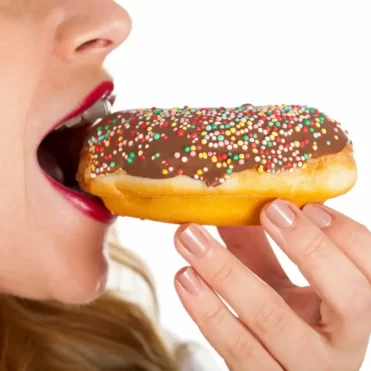 woman-eating-donut